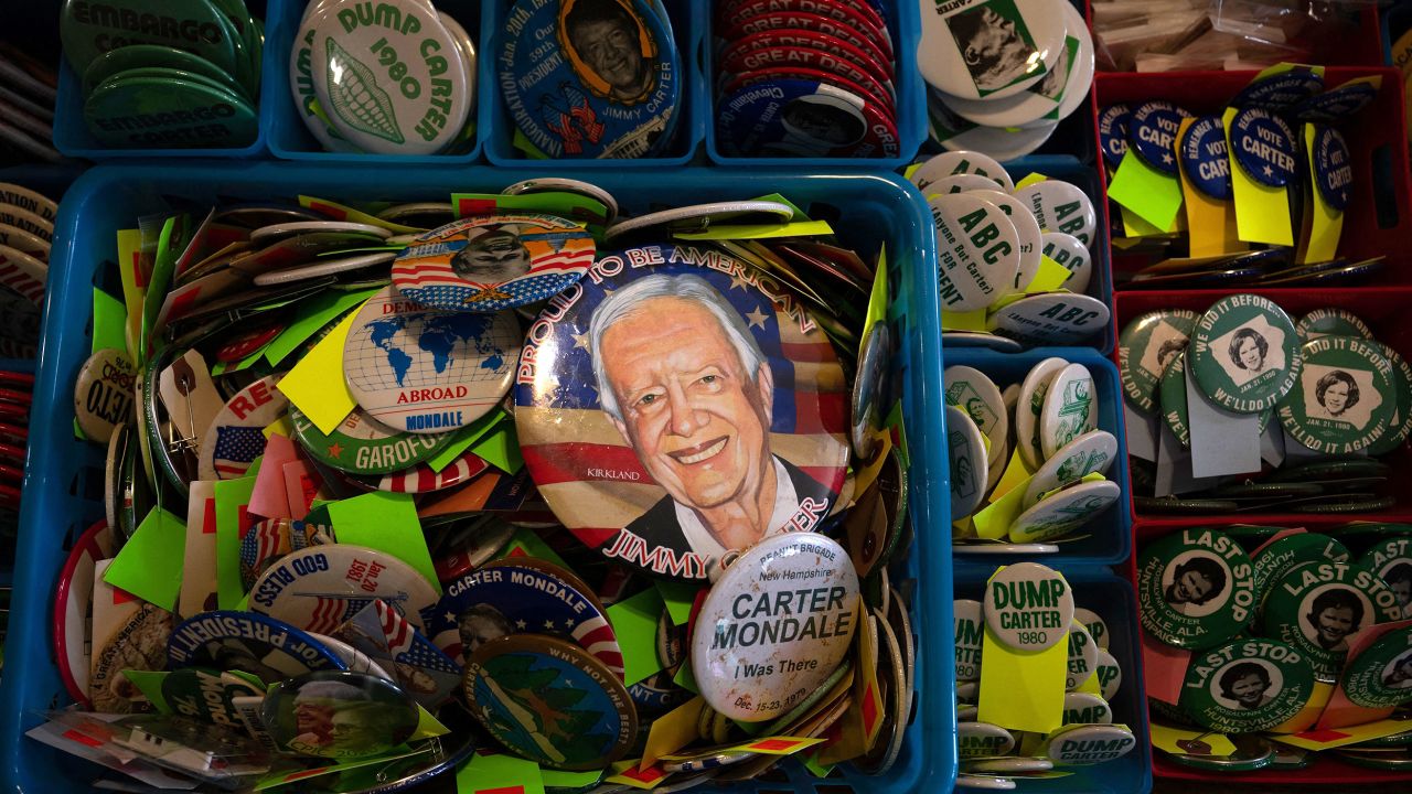 Campaign buttons for former President Jimmy Carter and others are seen in February in Plains.